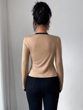 Ninonine "Valerie" | Contrast Piping Faux-Layered Top