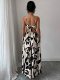 Ninonine "Alessia" | Ring-Detail Cutout Floral Maxi Dress