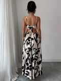 Ninonine "Alessia" | Ring-Detail Cutout Floral Maxi Dress
