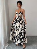 Ninonine "Alessia" | Ring-Detail Cutout Floral Maxi Dress