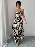 Ninonine "Alessia" | Ring-Detail Cutout Floral Maxi Dress