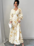 Ninonine "Aurelia" | Golden Foil Pleated V-Neck Maxi Gown