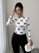 Ninonine "Colette" | Bow-Lattice Graphic Long Sleeve Top