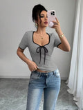 Ninonine "Amara" | Contrast Trim Bow-Front Knit Top