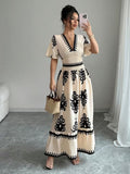 Ninonine "Amara" | Vintage Motif Shirred-Waist V-Neck Maxi Dress