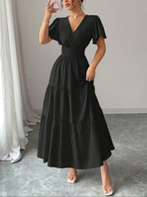 Ninonine "Calypso" | Criss-Cross V-Neck Tiered Vacation Maxi Dress