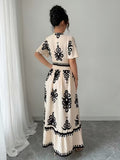 Ninonine "Amara" | Vintage Motif Shirred-Waist V-Neck Maxi Dress