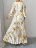 Ninonine "Aurelia" | Golden Foil Pleated V-Neck Maxi Gown