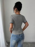 Ninonine "Amara" | Contrast Trim Bow-Front Knit Top