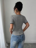 Ninonine "Amara" | Contrast Trim Bow-Front Knit Top