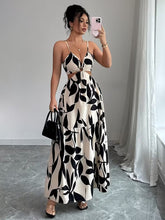 Ninonine "Alessia" | Ring-Detail Cutout Floral Maxi Dress