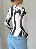Ninonine "Sloane" | Abstract Geometric Mock Neck Top