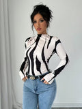 Ninonine "Sloane" | Abstract Geometric Mock Neck Top