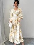 Ninonine "Aurelia" | Golden Foil Pleated V-Neck Maxi Gown
