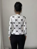Ninonine "Colette" | Bow-Lattice Graphic Long Sleeve Top