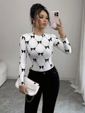 Ninonine "Colette" | Bow-Lattice Graphic Long Sleeve Top